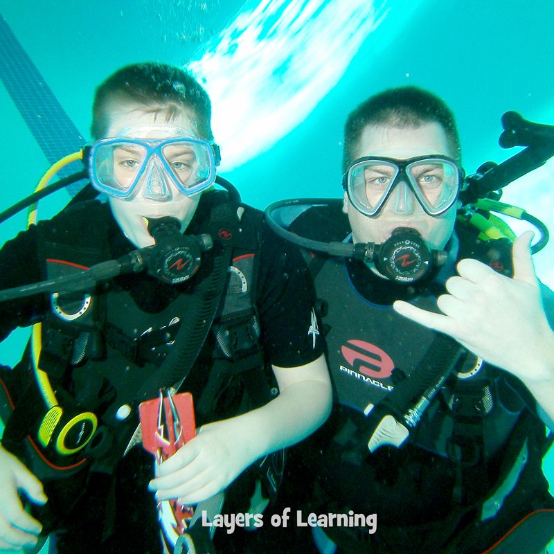 Father and son scuba diving
